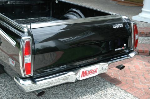 1972 Ford Ranchero - Rear view of a 1972 Ford Ranchero showing its distinctive taillights and 'Cyclone Spoiler' badging.