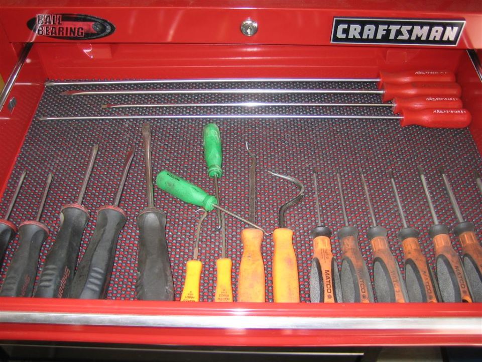 red craftsman tool drawer with screwdrivers and picks