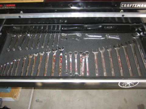 1994 Ford Bronco - A Craftsman tool drawer displays a collection of wrenches organized by size.