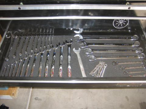 1994 Ford Bronco - A collection of wrenches organized in a tool drawer.