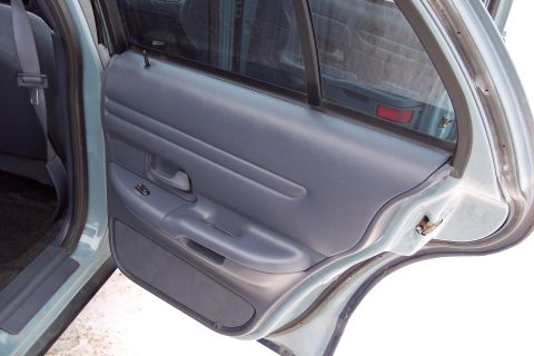 2001 Ford Crown Victoria - Rear passenger door panel and seat of a 2001 Ford Crown Victoria.