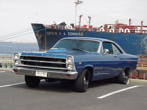 1966 Ford Fairlane - 1966 Ford Fairlane coupe parked in front of the ship 'CAPTAIN H. A. DOWNING'.