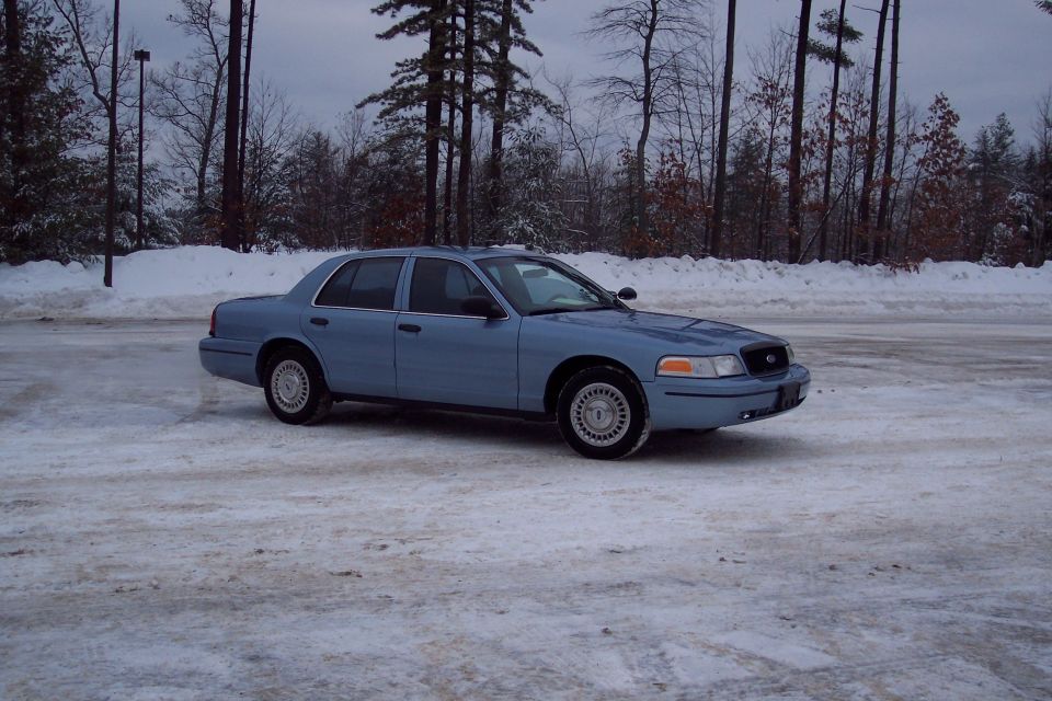 2001 Ford Crown Victoria parked on a snowy road
