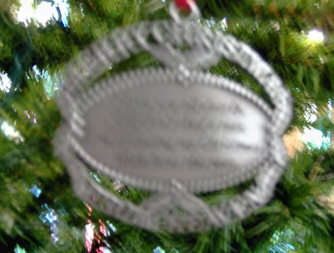 1978 Ford Bronco - A silver ornament with text is visible on a decorated Christmas tree.