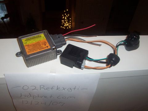 1993 Ford Probe - A car part with multiple wires and connectors is laid out on a surface, with handwritten notes below.
