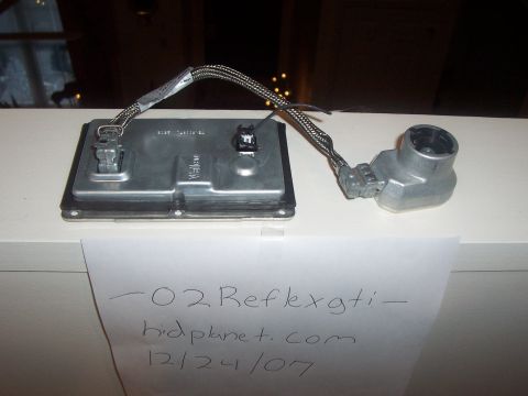 1993 Ford Probe - This image shows an HID ballast and igniter assembly, with a handwritten label indicating "-02 Reflexgti - hidplanet.com 12/24/07".