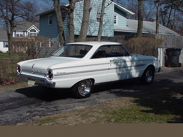 White 1963 Ford Falcon coupe parked in driveway