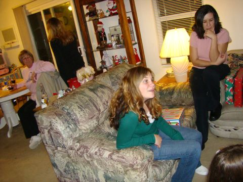 1989 Ford Bronco - People gathered in a living room during what appears to be a holiday celebration.