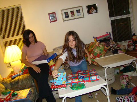1989 Ford Bronco - A family gathers to open gifts during the Christmas holiday season.