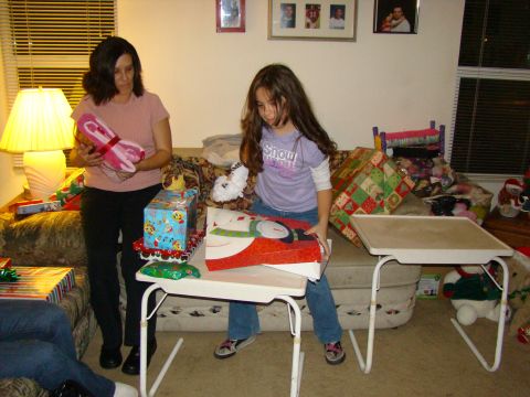 1989 Ford Bronco - A family opens presents during the Christmas holiday.