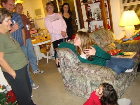 1989 Ford Bronco - A group of people are gathered in a living room, possibly for a holiday celebration.