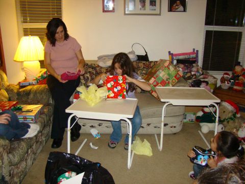 1989 Ford Bronco - A family enjoys opening presents on Christmas morning.