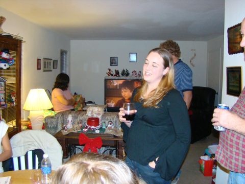 1989 Ford Bronco - A group of people are enjoying a holiday gathering in a decorated living room.
