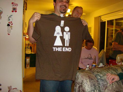1989 Ford Bronco - Two men display a humorous t-shirt with a wedding theme and the words 'THE END'.