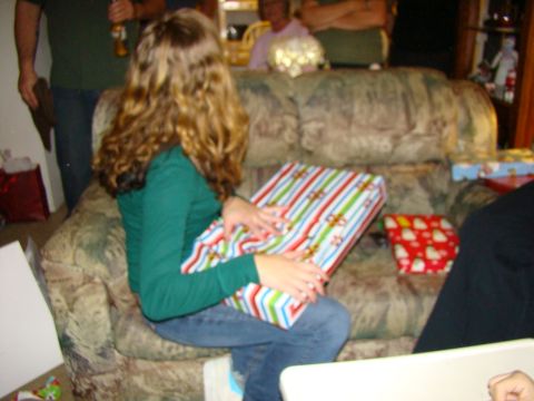 1989 Ford Bronco - A holiday gathering with gifts on a couch.