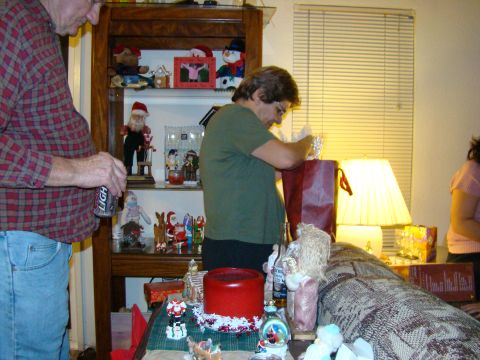 1989 Ford Bronco - A holiday gathering with people and festive decorations is captured in this indoor photograph.