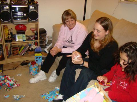 1989 Ford Bronco - A family enjoys opening gifts together during the holiday season.