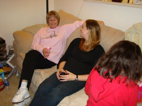 1989 Ford Bronco - A casual indoor scene shows three individuals relaxing together on a sofa.