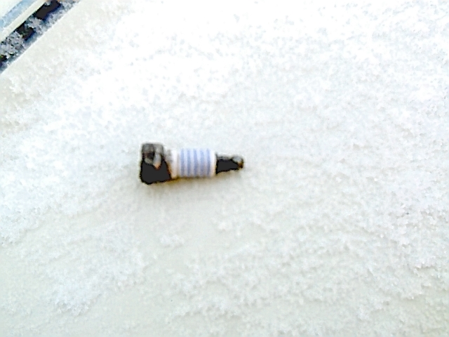 Broken Motorcraft Platinum Plug...broke just below the hex.