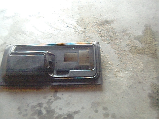 Newly painted door panel awaiting new cloth insert.  Any owner of the early model years knows how ratty they can get...and it doesn't help that the previous owner was a smoker so the cloth insert was shot.
