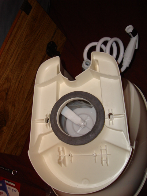 1983 Ford Bronco - Here is the bottom of the new potty. I instaled the new bottom gasket.
