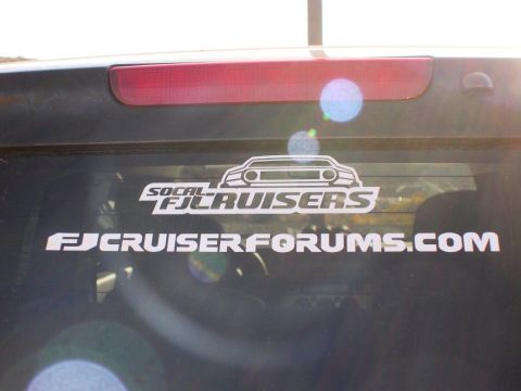 2007 Toyota FJ Cruiser - Decals on the rear window indicate the vehicle is associated with FJ Cruiser enthusiasts.