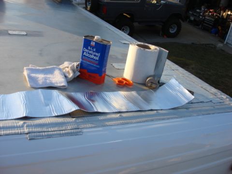 1983 Ford Bronco - I then cut out the correct size of roof tape. this has a silver side (TOP) and a paper side (this needs to be removed)