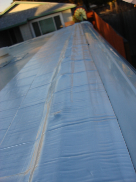 1983 Ford Bronco - the next row sealed 1/2 on the 1st line of roof seal i put down and completly covered the old seal onto new fiberglass of the end cap. i th…