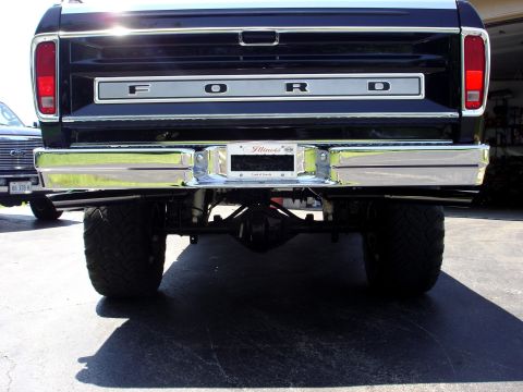 1979 Ford F-250 - This 1979 Ford F-250 pickup truck is viewed from the rear, showing its tailgate and chrome bumper.