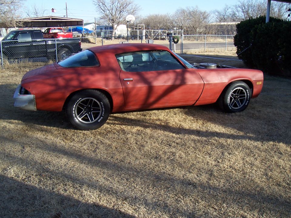 Red 1979 Chevrolet Camaro coupe, side view, hood open