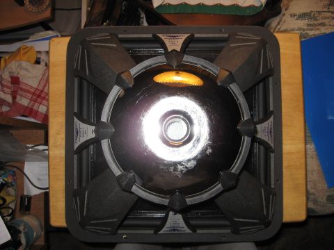 1992 Ford Crown Victoria - A speaker component is shown from the front, with visible text on its frame.