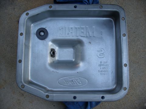 2005 Ford Crown Victoria - This is a Ford transmission pan with "METRIC" and the Ford logo visible. The registry claims it is from a 2005 Ford Crown Victoria, but thi…