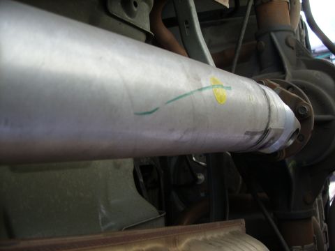 2005 Ford Crown Victoria - Underside view of a vehicle's driveshaft and rear axle components.