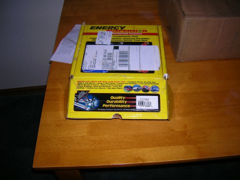 1979 Ford Bronco - A box of Energy Suspension polyurethane components is shown on a wooden table.