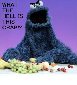 1988 Mercury Grand Marquis - Cookie Monster expresses frustration over a pile of fruit, with a Supermotors.net logo at the bottom.