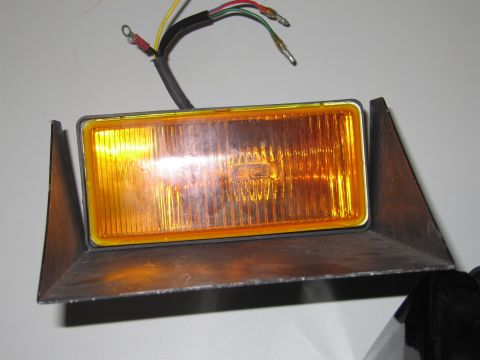 2001 Ford Crown Victoria - Amber fog light assembly with wires and connectors.