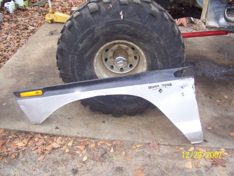 1978 Ford Bronco - A vehicle fender and a large tire are shown, with 'TELLICO TESTED' text visible on the fender.