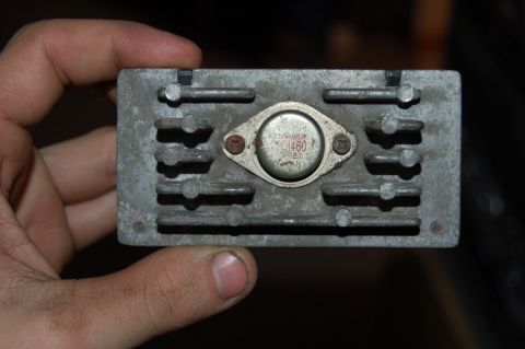 1989 Ford Probe - Close-up of an electronic component with a heatsink, showing visible text and part numbers.