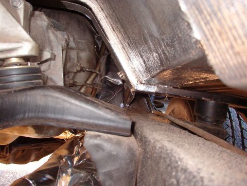 1975 Ford Bronco - The Energy polyurethane t-case mounts are shimmed with washers so the AOD adapter (from Advanced Adapters) clears the crossmember without T…