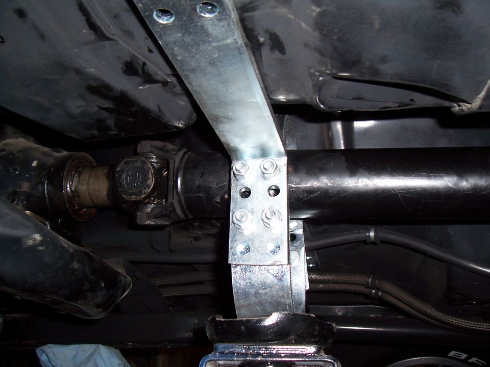 Custom metal bracing on a vehicle's driveshaft