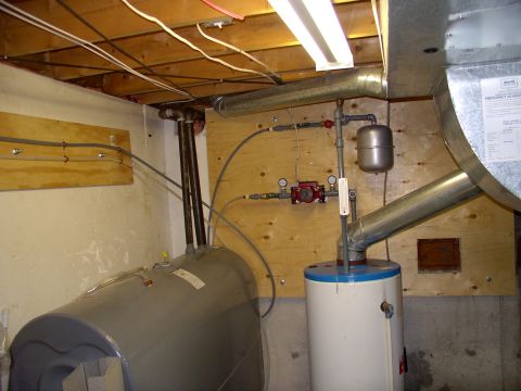 1986 Ford Bronco - Separate oil water heater filled with glycol. Small cushion tank, very small 3 speed pump (less than 1 amp). Auto pressure release valve at…