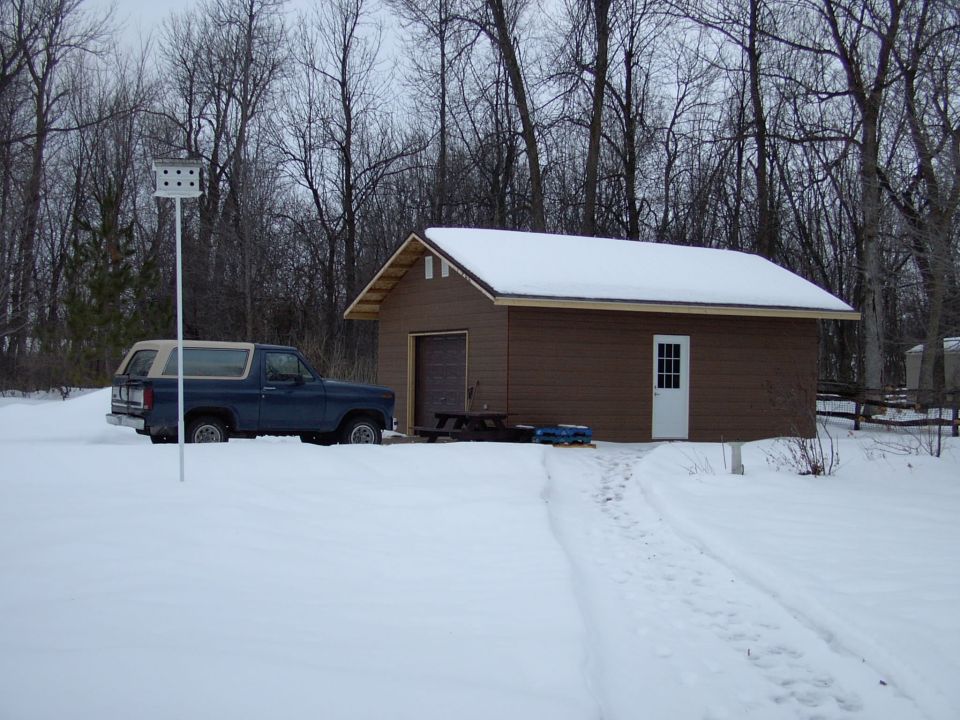 Siding nearly done, except the rear peak and the corners. Soffit to come. Can we beat the really cold weather ????