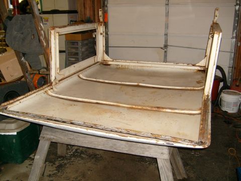 1974 Ford Bronco - This is a disassembled hardtop for a Ford Bronco, showing signs of age and rust.