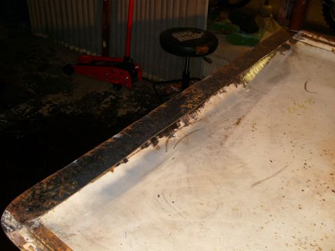 1974 Ford Bronco - Rusted metal panel shows handwritten markings; the vehicle claim is not supported by the image.