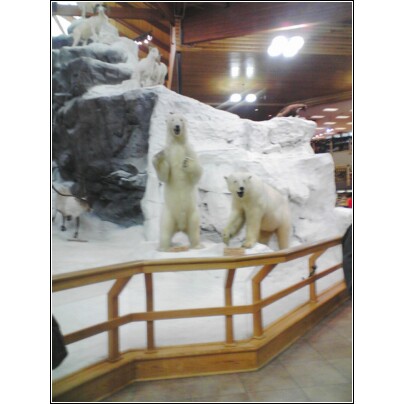 2004 Jeep Wrangler - A diorama taxidermied polar bears and goats in a snowy, mountainous environment.