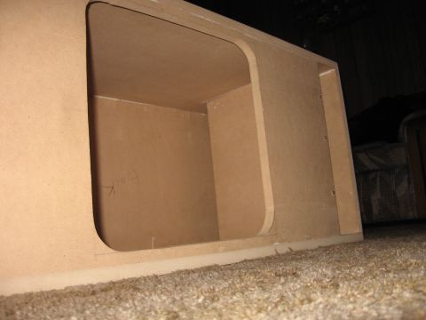 1992 Ford Crown Victoria - A custom-built wooden enclosure, possibly for audio equipment, is shown with its interior compartments.