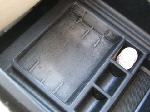 2003 Ford Taurus - Removed tabs from cassette holder to make a large bin.