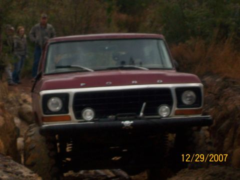 1978 Ford Bronco - This 1978 Ford Bronco navigates a challenging rocky path, its off-road capabilities.