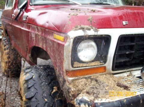 1978 Ford Bronco - Muddy 1978 Ford Bronco shows off its off-road tires and front end after an outing.