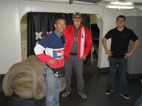 1989 Ford F-250 - Three men pose for a photo indoors, with a large coil of rope to their left.